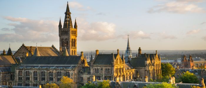 A view of the Gilbert Scott Building at sunset