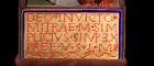 Reconstructed Roman inscription in gold and red paint