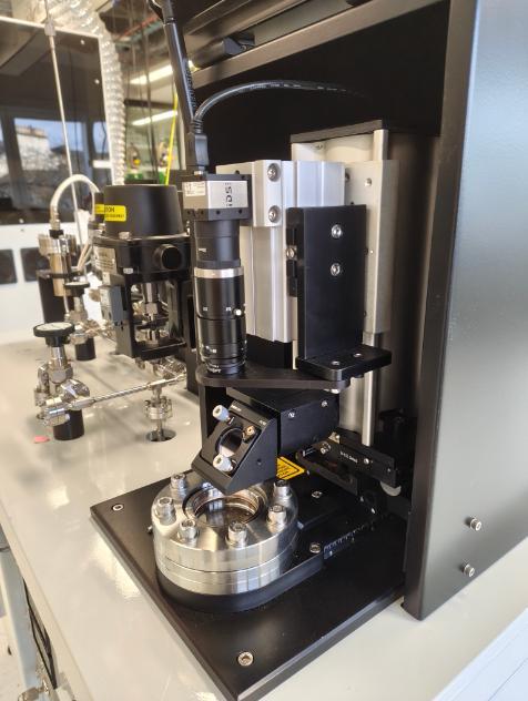 Alphachron laser chamber with vision system and x-y stage.