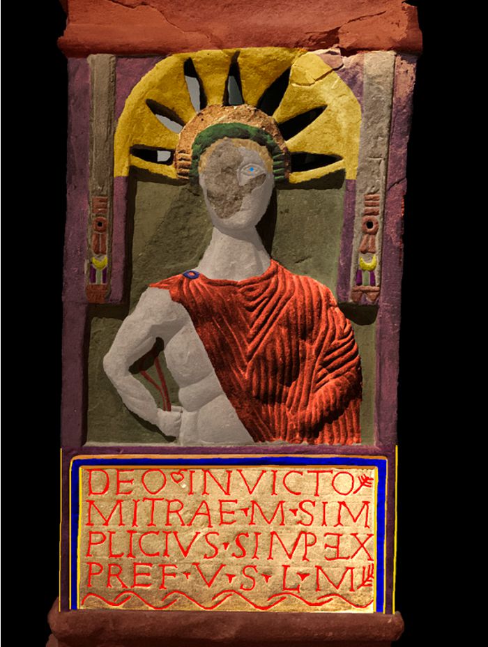 Mithraic Altar from Carrawburgh Roman Fort, showing a figure and inscription painted in the original colours of red, purple and gold (photograph : Louisa Campbell)