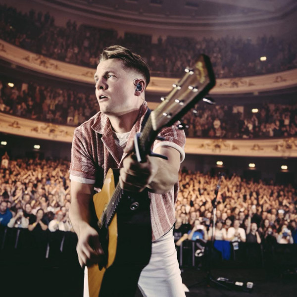 Robert Robertson performs with his band Tide Lines