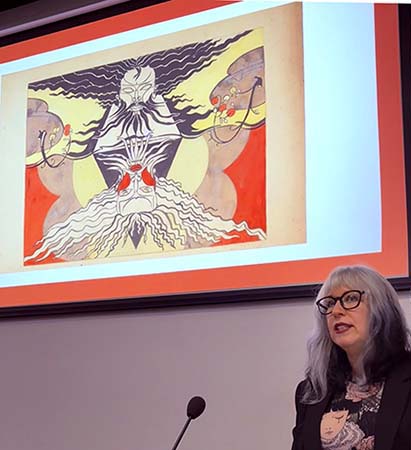 Amy Hale delivering a talk
