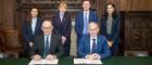 Strategic Partnership Agreement signing: pictured, left to right from the back, Siobhan Reilley, Head of Strategic Engagement, Cabinet Office Second Headquarters; Rachel Sandison, Vice Principal (External Relations) and Deputy Vice Chancellor (External Engagement); Matthew Allan, Deputy Director, Government Security Centres and Assurance and Deputy SRO, Cabinet Office Second Headquarters; Uzma Khan, Vice Principal for Economic Development and Innovation and Deputy Chief Operating Officer; (front row) Vincent Devine, Senior Sponsor for the Cabinet Office in Scotland and Government Chief Security Officer, and Professor Andy Schofield, Principal and Vice Chancellor of the University of Glasgow.