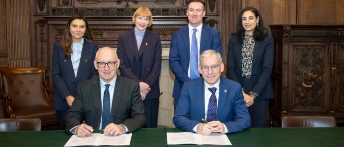 Strategic Partnership Agreement signing: pictured, left to right from the back, Siobhan Reilley, Head of Strategic Engagement, Cabinet Office Second Headquarters; Rachel Sandison, Vice Principal (External Relations) and Deputy Vice Chancellor (External Engagement); Matthew Allan, Deputy Director, Government Security Centres and Assurance and Deputy SRO, Cabinet Office Second Headquarters; Uzma Khan, Vice Principal for Economic Development and Innovation and Deputy Chief Operating Officer; (front row) Vincent Devine, Senior Sponsor for the Cabinet Office in Scotland and Government Chief Security Officer, and Professor Andy Schofield, Principal and Vice Chancellor of the University of Glasgow.