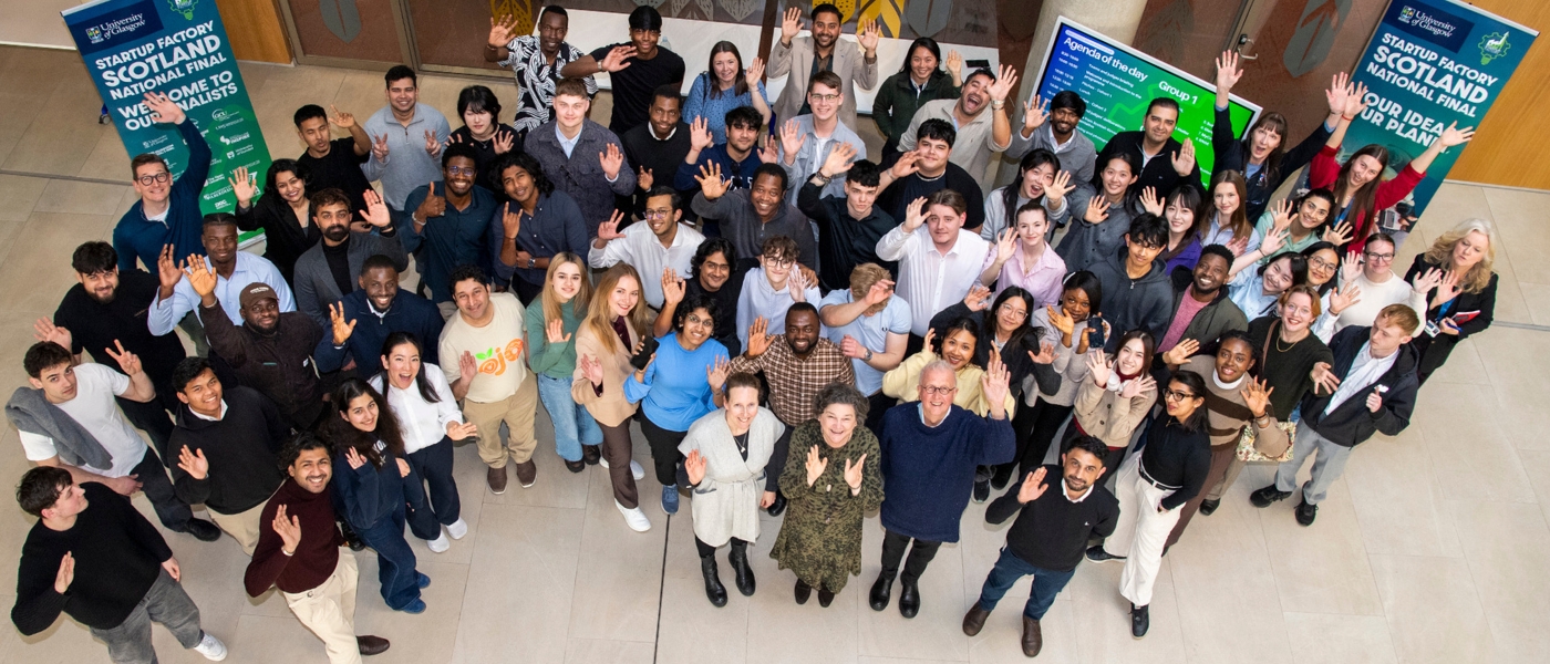 Student entrepreneurs from across Scotland at the grand final of StartUp Factory Scotland, photographed alongside judges and event organisers.
