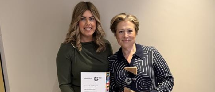 Business School representatives collect the School's Athena Swan Silver Award