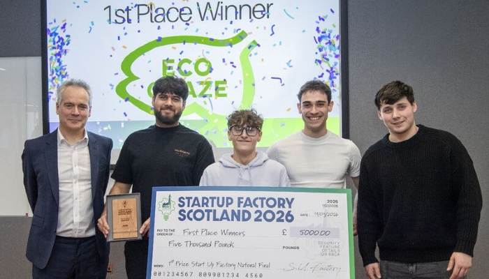 A team involving two fourth year Microbiology students Rayan Ishraq and James Mclauchlan stood with a novelty cheque for taking first place in this year’s Startup Factory Scotland Grand Final. The four members of the ECO Graze group are stood with a Startup Factory Scotland representative