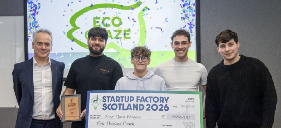 A team involving two fourth year Microbiology students Rayan Ishraq and James Mclauchlan stood with a novelty cheque for taking first place in this year’s Startup Factory Scotland Grand Final. The four members of the ECO Graze group are stood with a Startup Factory Scotland representative