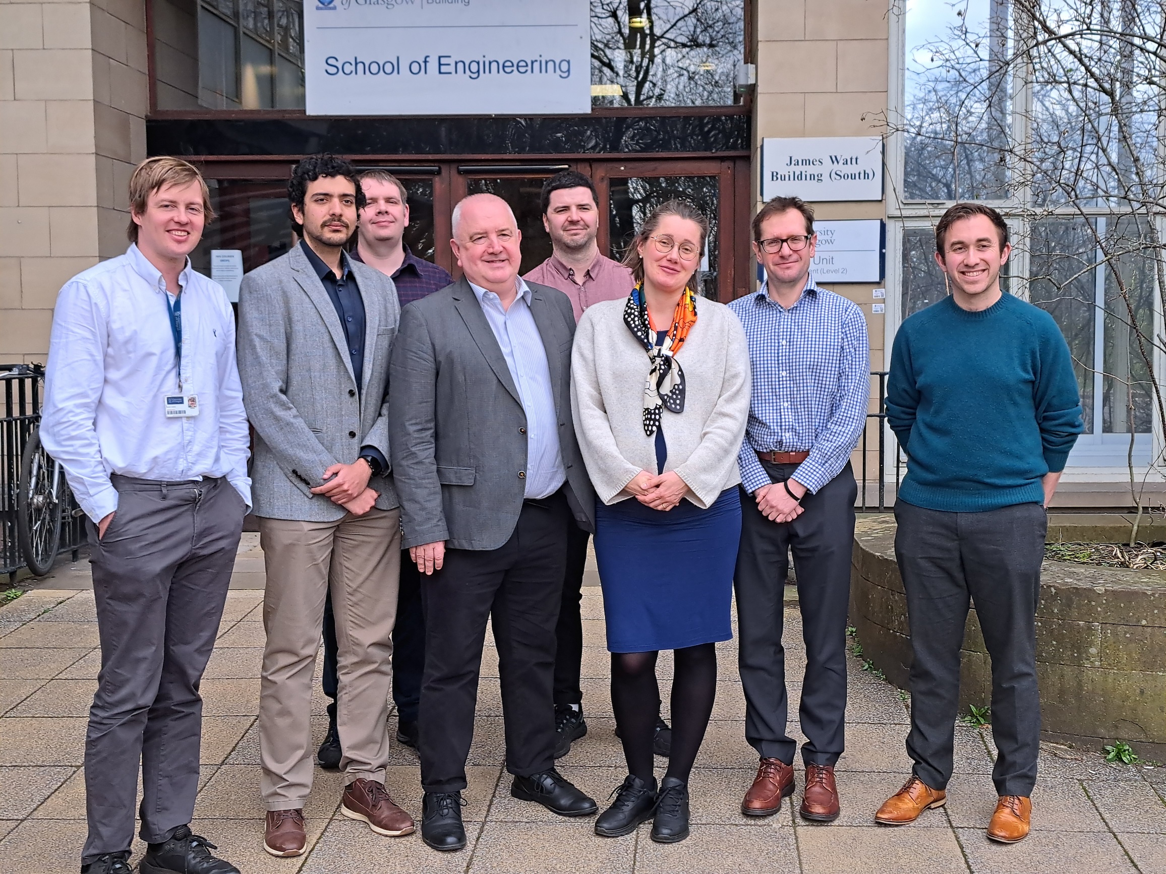 Martin Rhodes with members of the REACT team at the James Watt School of Engineering