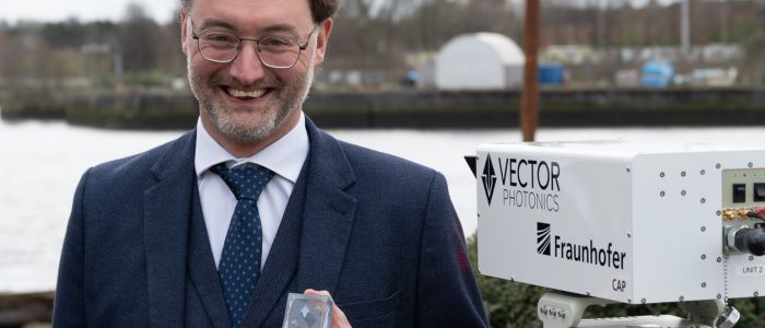 Dr Richard Taylor, CEO and Founder of Vector Photonics, with the PCSEL and optical communications system at the successful demo across the Clyde.