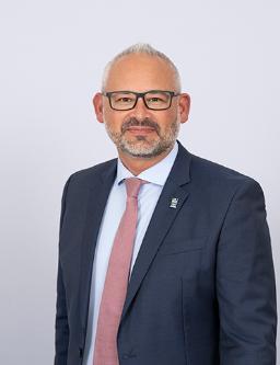 Head shot of Professor Christopher Loughrey