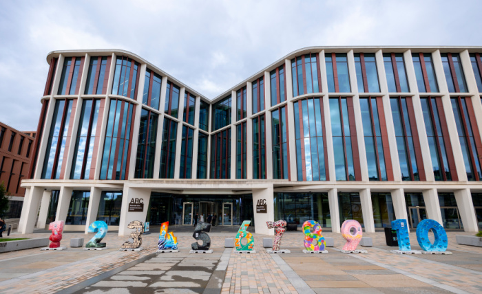 Giant individually designed numbers 1-10 sit in a row outside the ARC as part of the MPN exhibition