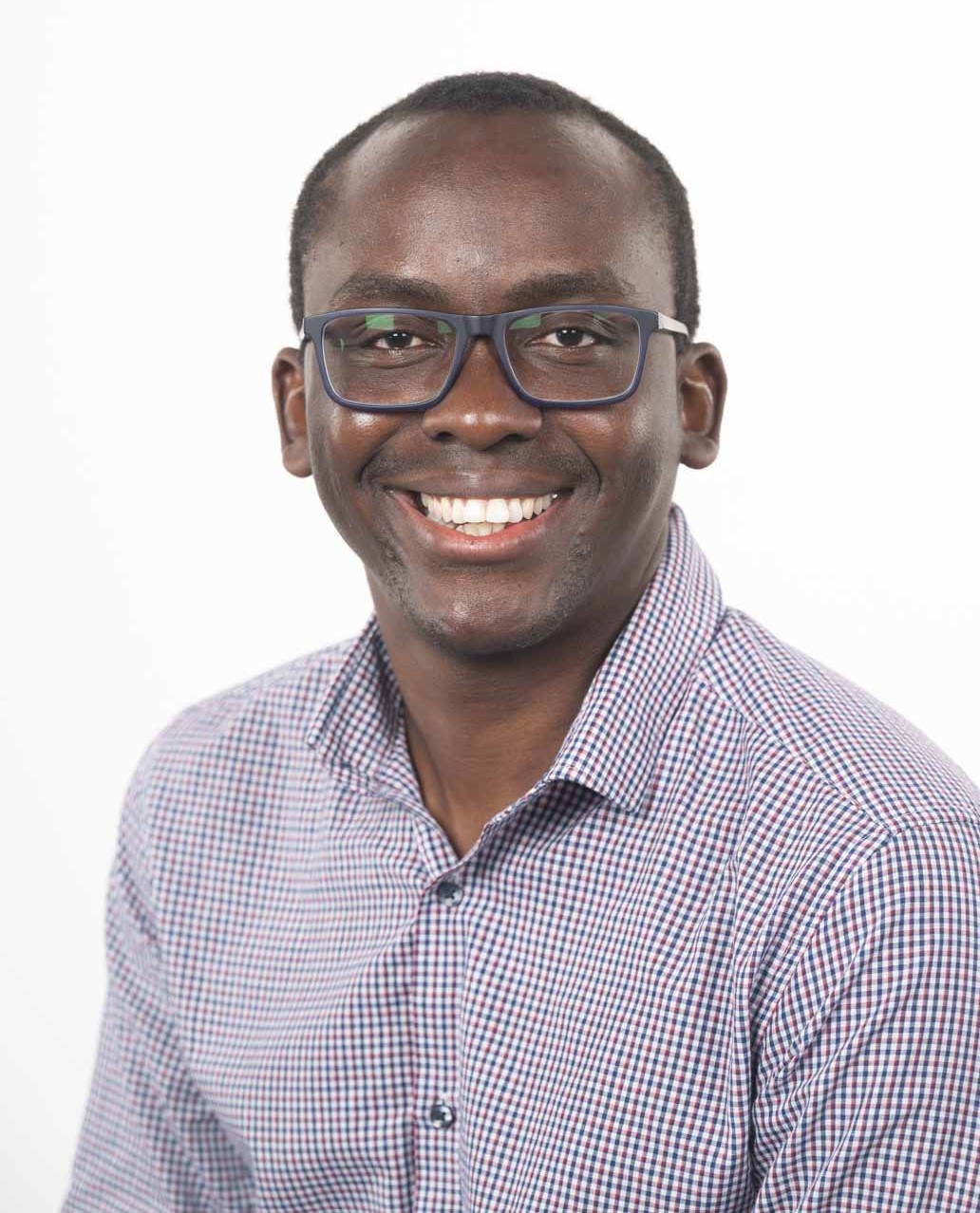 A head and shoulders portrait shot of Dr Enoch Mararo