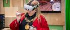 A woman in a VR headset