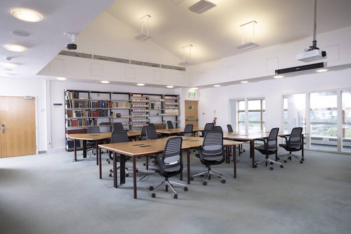 An image of the Level 12 Reading Room on Level 12 of the University Library, with chairs around 4 desks.