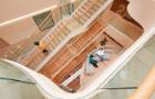An interior image of a building with people interacting