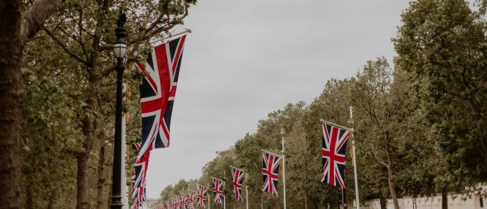 Union Jack flags adorn The Mall in London, emphasizing British heritage