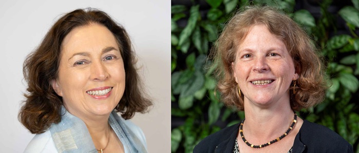 Two smiling women - Professors Frances Mair on the left and Petra Meier on the right