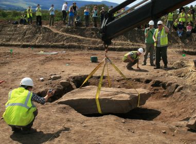 Removal of the massive slab begins