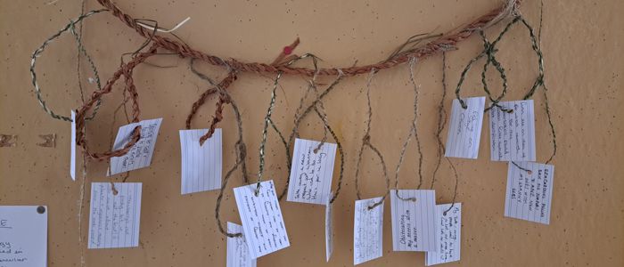 Wall hung snare with student made cordage and notes