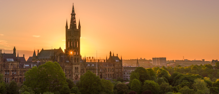 An aerial drone shot of the Gilbert Scott Building during sunrise