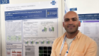Dr Alfredo Montes Gomez stands beside his award-winning research poster at the 49th European Cystic Fibrosis Conference in Lisbon, Portugal. The poster, displayed at the University of Glasgow exhibition stand, presents research investigating the effect of Staphylococcus aureus on the lung epithelial barrier in cystic fibrosis.