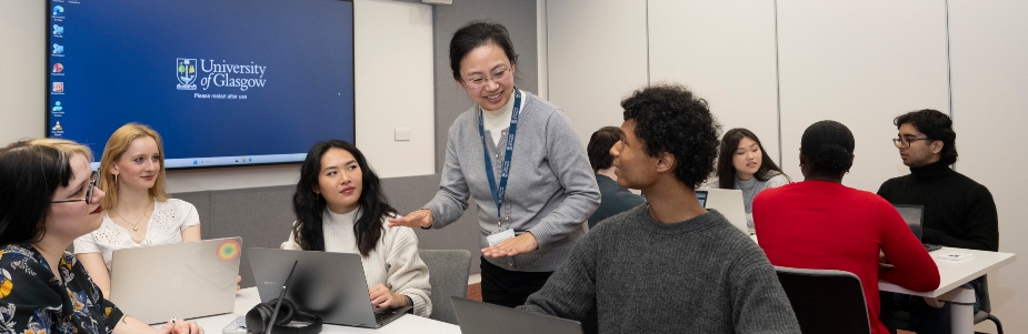 Students in a class with Urban Studies lecturer, Professor Jing Yao
