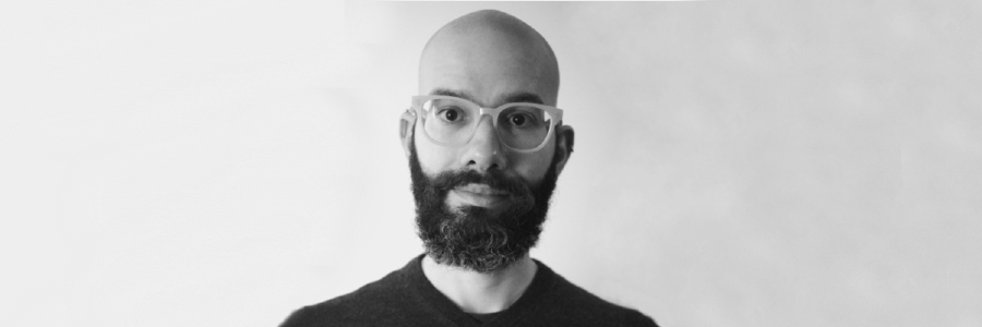 A black and white head and shoulders portrait shot of leandro lemgruber