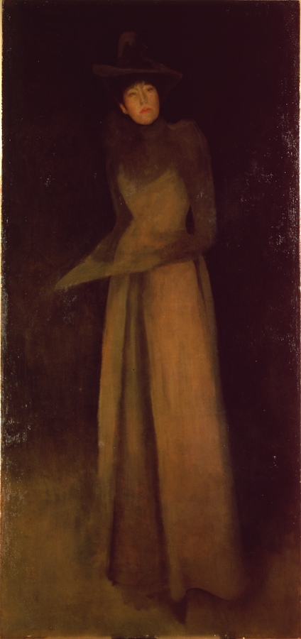 A Whistler portrait painting of a woman in a two-tone brown dress, holding something, stood looking off to the side.