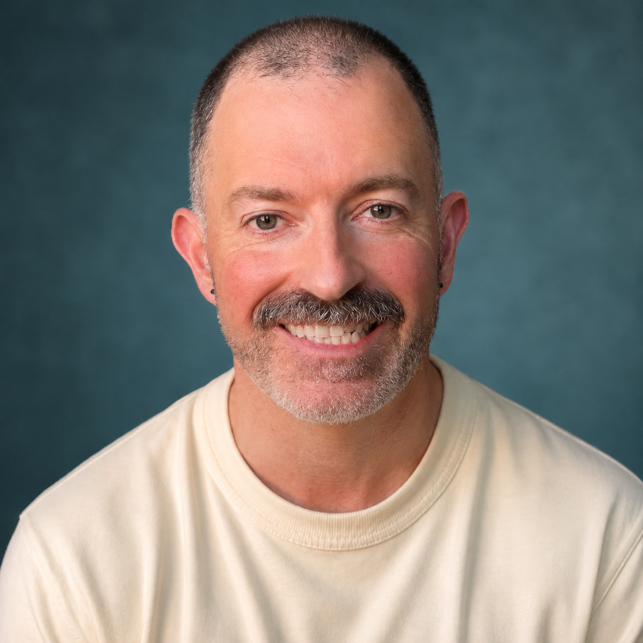 This image is a profile picture of Micky Ross
