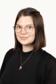 A portrait photo of Jasmin