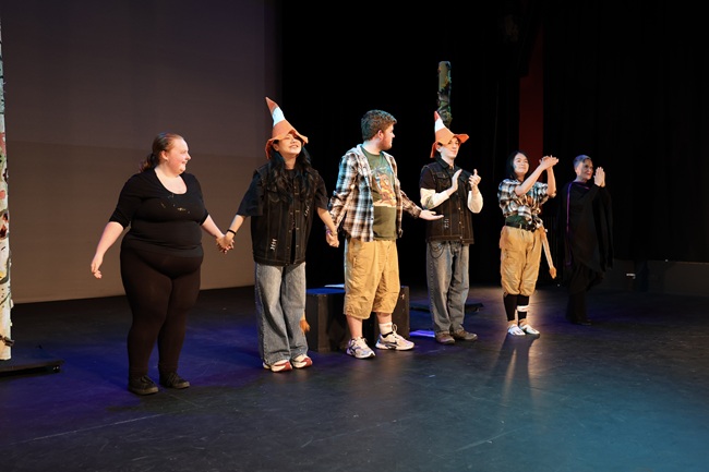 Some of the cast and crew of the Lion and Unicorn play. Credit Abigail Morris Some of the cast take a bow on a stage at the end of the Lion and Unicorn play
