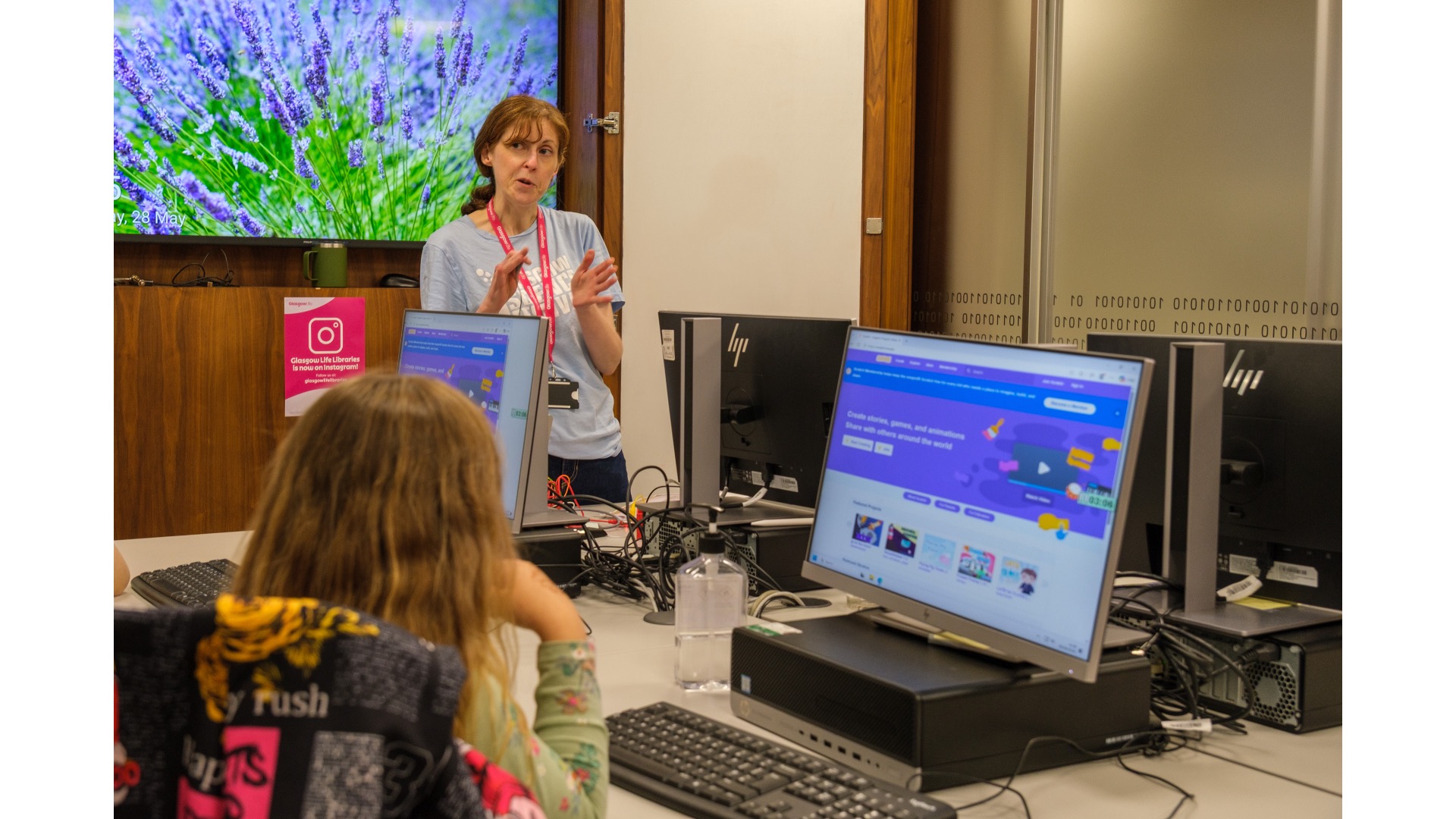 Photograph of a child using a computer.