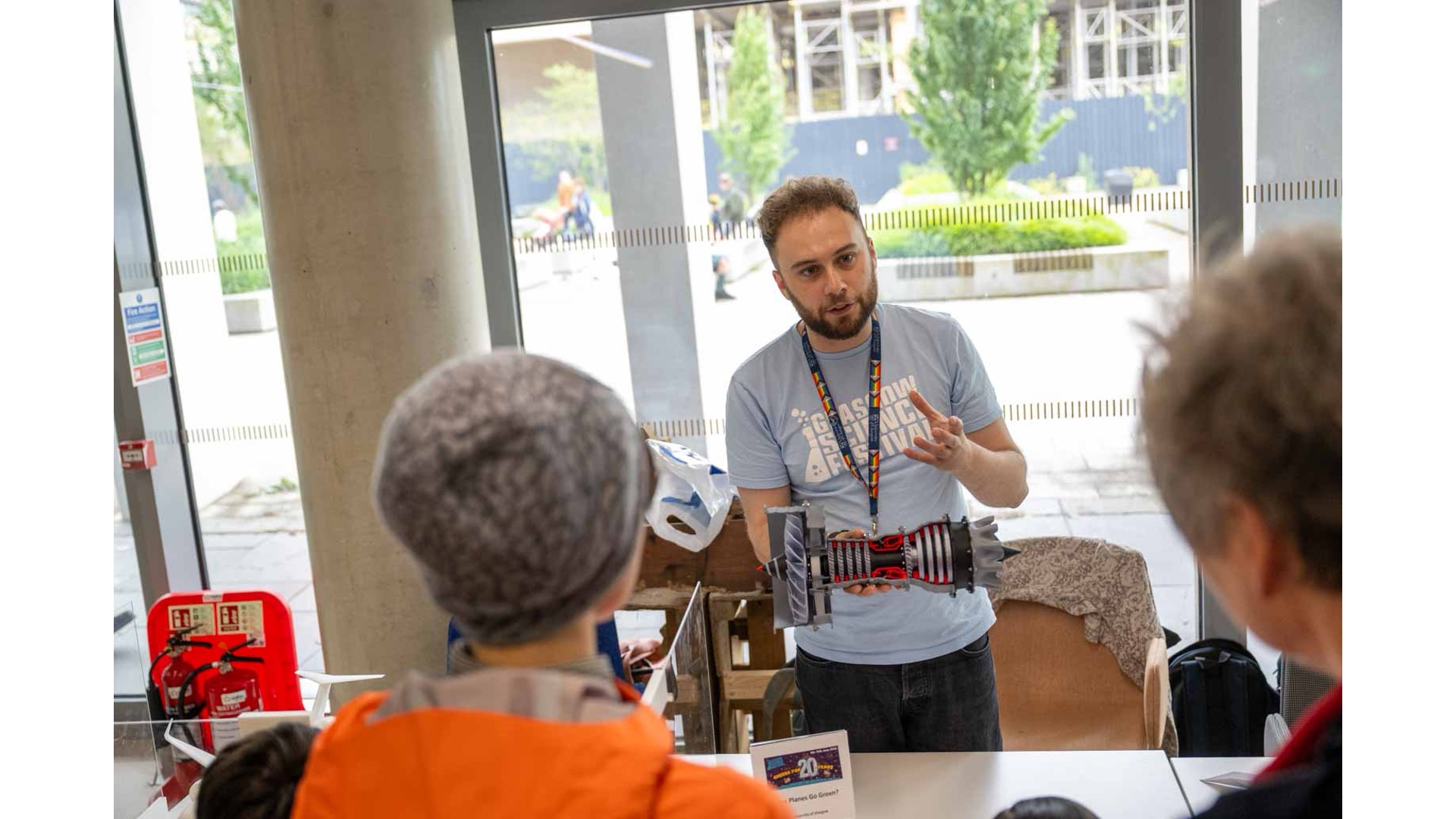 Photograph of a GSF volunteer with an instrument at the Dear Green Music Scene festival.