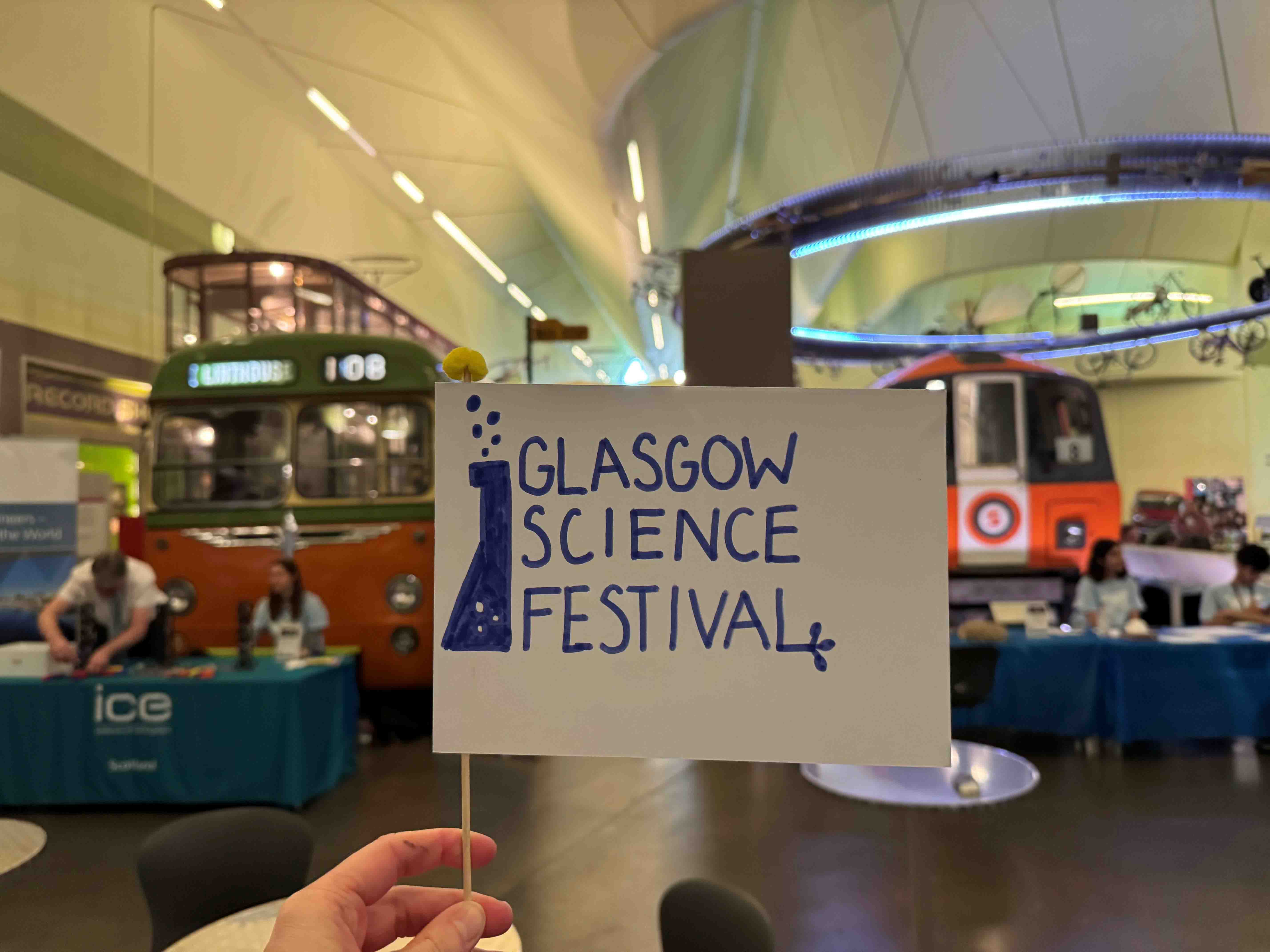 Photograph of a flag with a hand drawn GSF logo