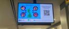 Display LED screen ceiling mounted with a graphic and QR code
