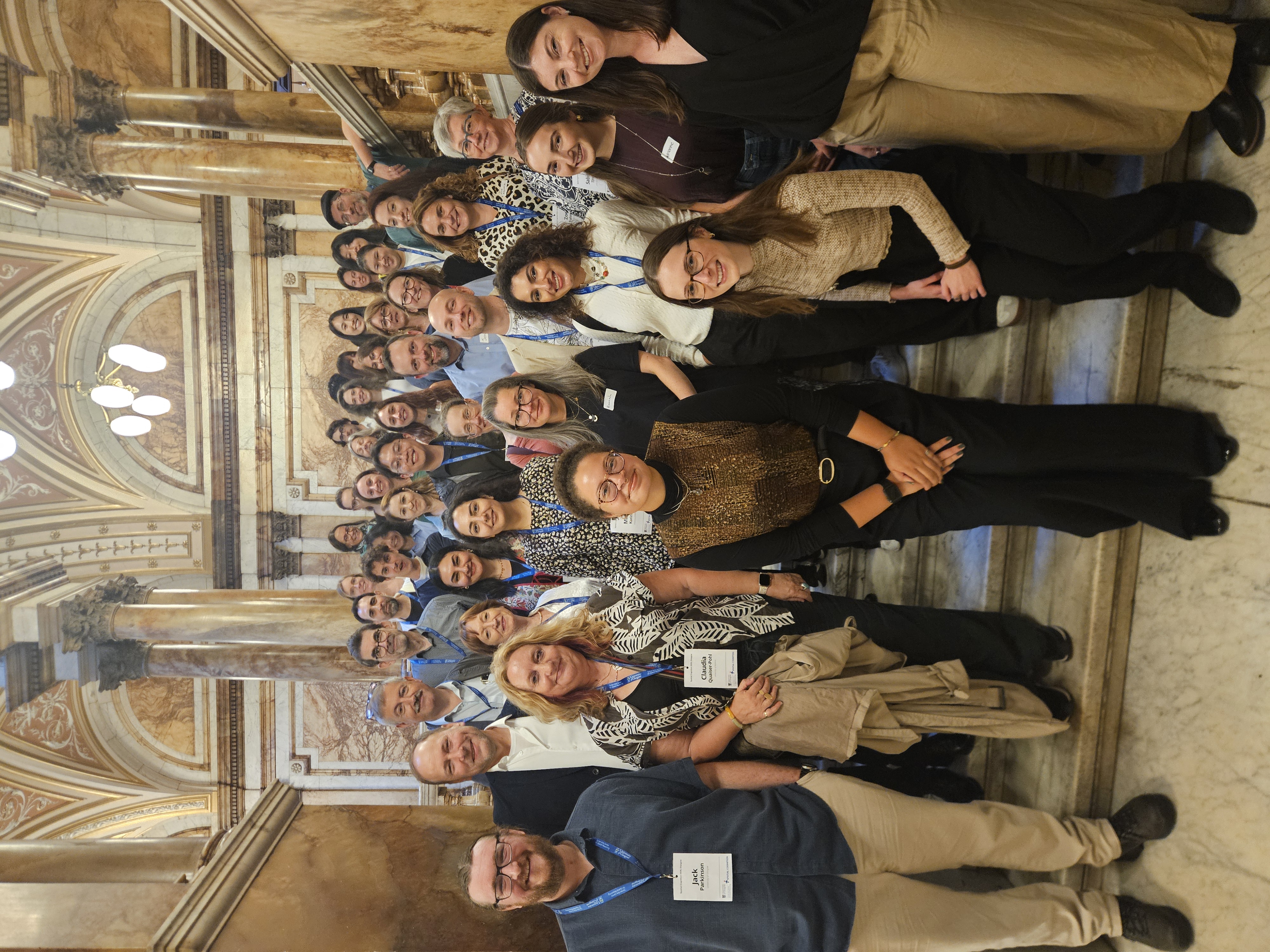 Conference attendees gathered on steps