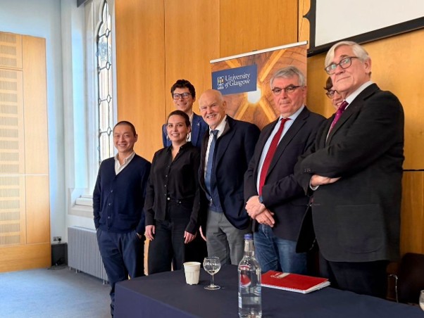 PEFF co-leads Mingzhe Zhu, Franziska Paul, Bernhard Reinsberg, and Sean Vanatta, with former Greek prime minister George Papandreou and Professors Panayiotis Tsakloglou and Platon Tinios after the PEFF panel