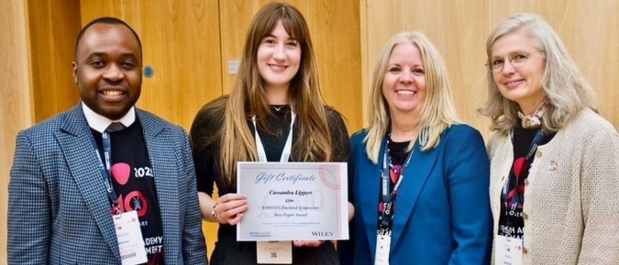 Cassandra Lippert recieving her award