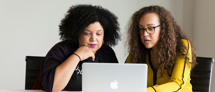 Two women on video call. Photo by Christina@wocintechchat on Unsplash.