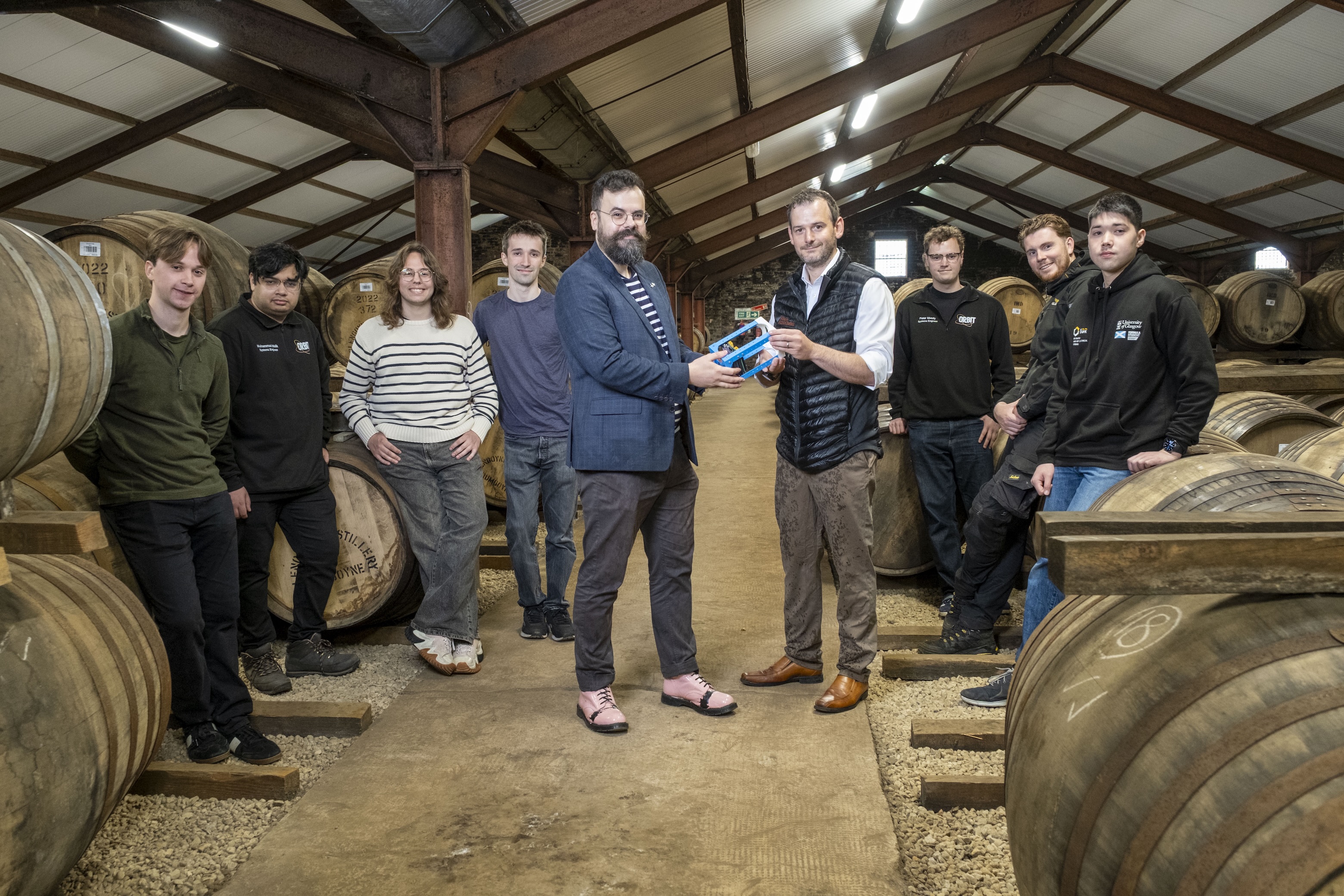 Glasgow engineering students Micah Chapman, Muhammad Taha Malik, Liam Alkire and Milo Godwin; Dr Gilles Bailet of the University of Glasgow’s James Watt School of Engineering and Geoff Nisbet of Allen Associates; Glasgow engineering student Peter Moody, Glengoyne Distillery warehouse team leader Gregg Black, and Glasgow engineering student Yuki Suter are pictured at Glengoyne Distillery, Dumgoyne