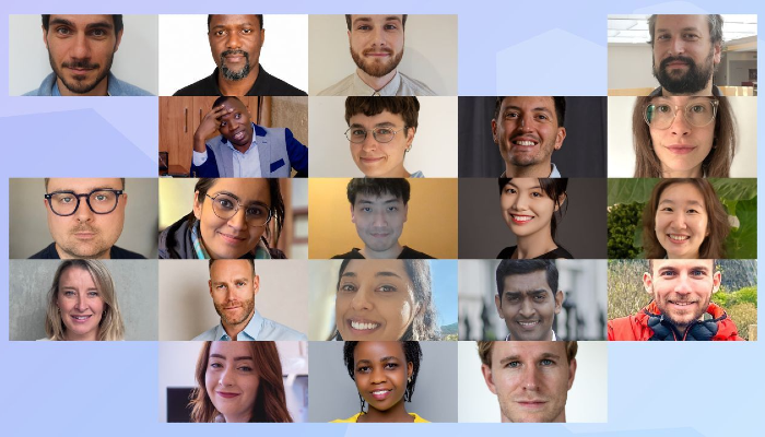 A collage of headshots featuring 21 researchers announced as recipients of Wellcome Early-Career Awards, including Dr Sarah K Walsh of the MRC-University of Glasgow Centre for Virus Research (CVR) in the bottom-left section, arranged against a pale blue geometric background.