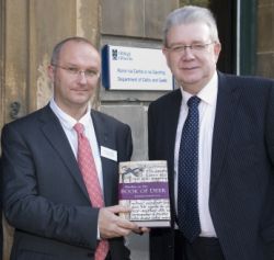 Professor Roibeard Ó Maolalaigh presented Mike Russell MSP with 'Studies on the Book of Deer.' 