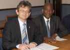 Prinicipal Professor Anton Muscatelli signs an MOU with the University of South Africa in the company of High Commissioner of South Africa