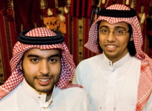 Saudi students Abdullah Al Owaifeer, of Stirling University, and Saif Al Ghamdi, of Glasgow Caledonian University attend an exhibition organised by the Glasgow Saudi Student Club at the University of Glasgow's Hunter Halls.