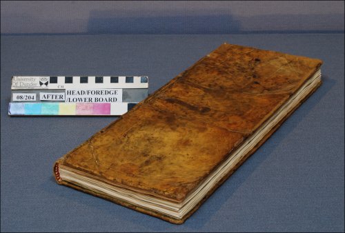 This photograph shows a three quarter view of the front cover of the logbook after conservation treatment.  (GUAS Ref: UGC 182. Copyright reserved.)