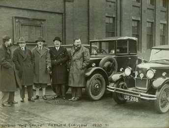 Theatre impresario Horace Collins (far right) with Dave Willis (centre), c.1930