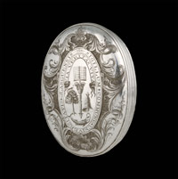 Oval silver box engraved with the University crest 