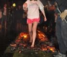Beatson firewalk: woman walking on coals