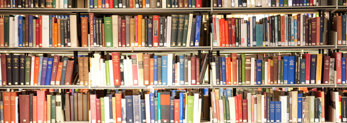 Photograph of library books on shelves in Glasgow University Library